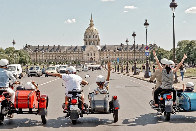 Paris Highlights city tour on a vintage Sidecar Motorcycle - Meeting at Place Saint-Michel, Then Notre-Dame Appears Early