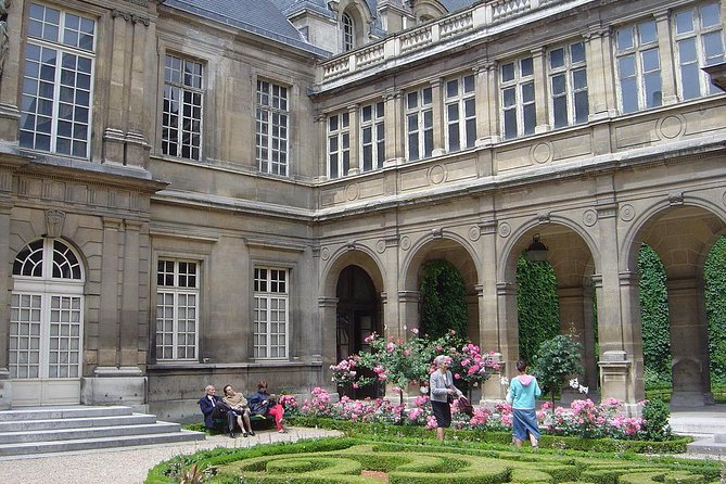 Paris Le Marais Historical Walking Tour with Wine and Cheese Tasting - Village Saint-Paul: antique lanes and local calm