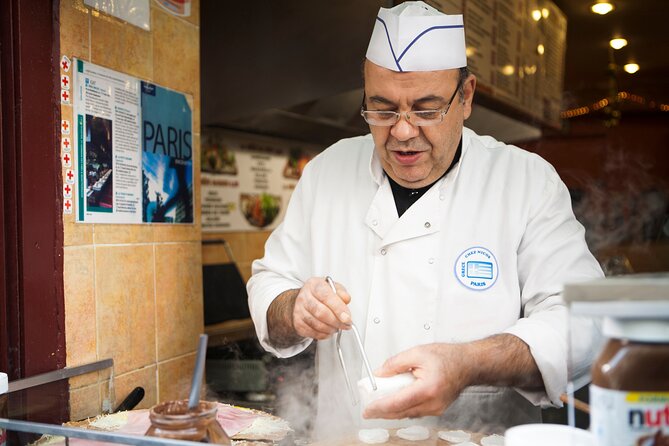 Paris Le Marais: Private French Food & Wine Walking Tour - Stop 1 at Le Sancerre: charcuterie, cheese, and your first wine pour