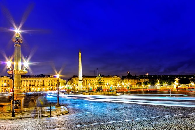 Paris Lights Evening Bus Tour with Eiffel Tower Summit Option - Champs-Élysée and the Arc de Triomphe: The Big Boulevard Energy