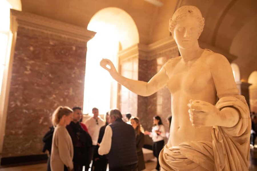 Paris Louvre Exclusive Semi Private Guided Tour Max 6 People - Finding the Start Point: Under the Louis XIV Statue Area