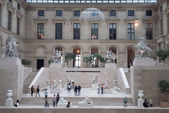 Paris: Louvre Museum Tour Mona Lisa & Iconic Masterpieces - Entering the Louvre Pyramid: what the pre-reserved ticket changes