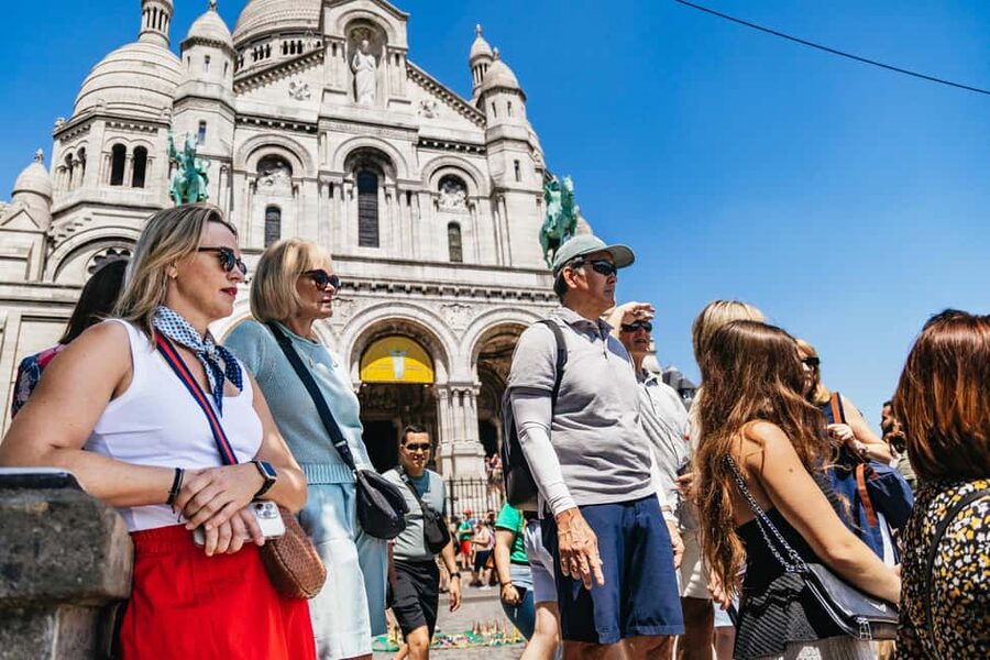 Paris: Montmartre Cheese, Wine & Pastry Guided Walking Tour - Place du Tertre: artists, cafés, and the real Montmartre vibe