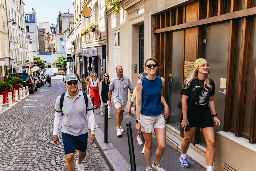Paris: Montmartre Cheese, Wine & Pastry Guided Walking Tour - Le Moulin Rouge: the iconic moment, done properly