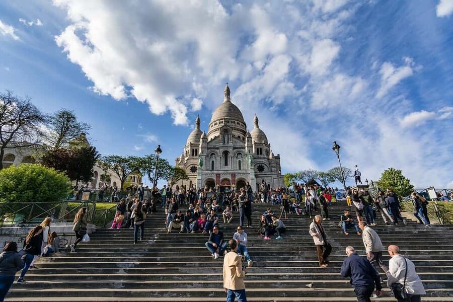 Paris: Montmartre hidden gems walking Tour with Local Guide - Starting at Sacré-Cœur, where your guide sets the tone