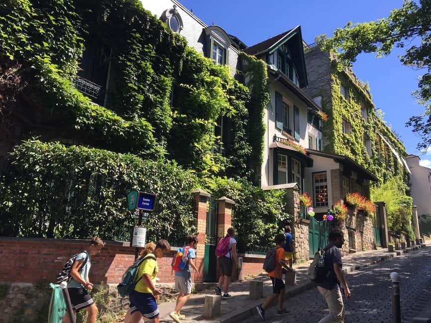 Paris : Montmartre highlights walking tour - Starting at Place Blanche, then stepping into Moulin Rouge country