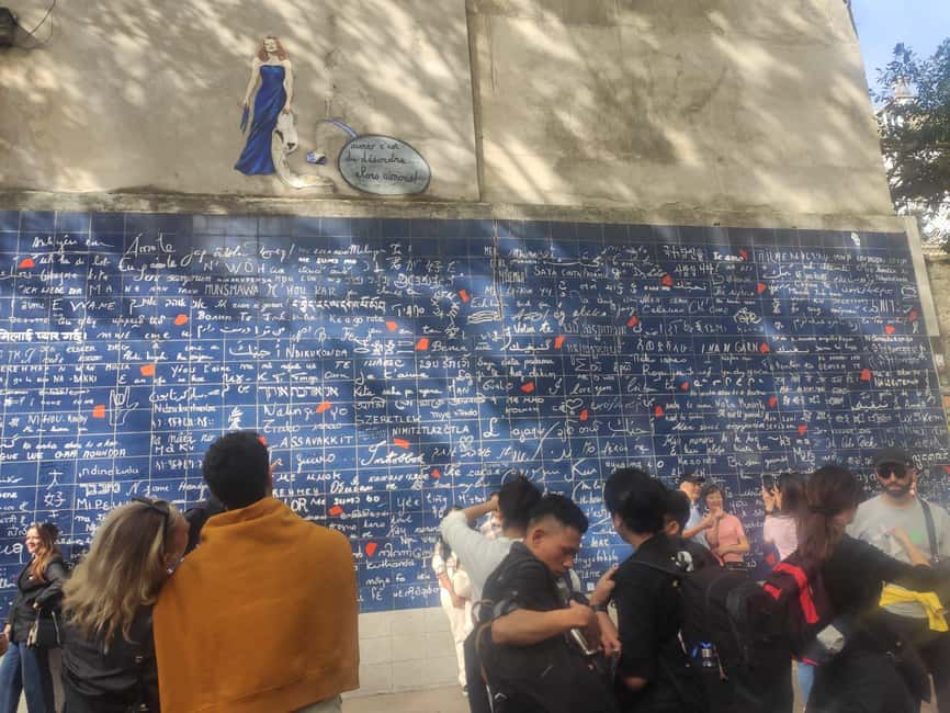 Paris : Montmartre highlights walking tour - The art trail: Wall of Love, Moulin de la Galette, and names you can picture