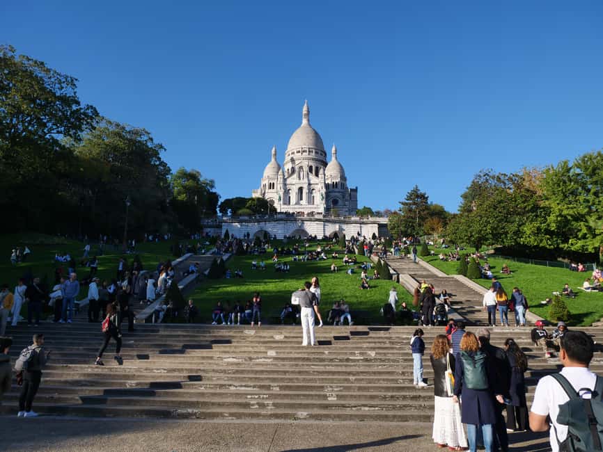 Paris: Montmartre Must-See Walking Tour with a Local Guide - Carrousel de Saint-Pierre to Louise Michel Gardens, get your bearings fast