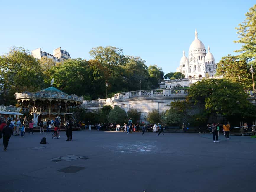 Paris: Montmartre Must-See Walking Tour with a Local Guide - Place du Tertre and Square Nadar: where Montmartre’s creative story becomes real