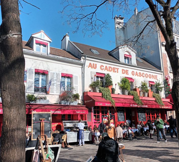 Paris: Montmartre Private Guided Tour & River Cruise Option - Moulin Rouge at the foot of the hill: iconic, but see it with context