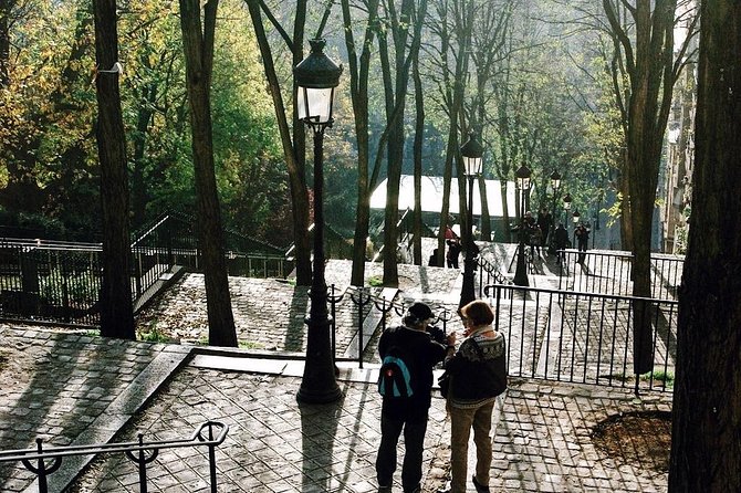 Paris Montmartre & Sacre Coeur Semi-Private Guided Tour 12ppl Max - Dali, Bateau-Lavoir, Dalida, and the names that explain the neighborhood