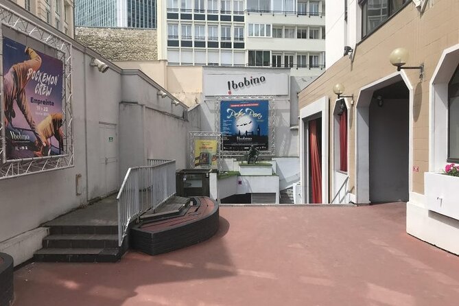 Paris Montparnasse Tower Guided Tour with Best View of the City - Rue de la Gaité: the theater street energy