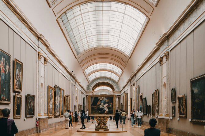 Paris: Night at the Louvre 6-people Max Guided Experience - Nighttime reality check: crowded can still mean crowded