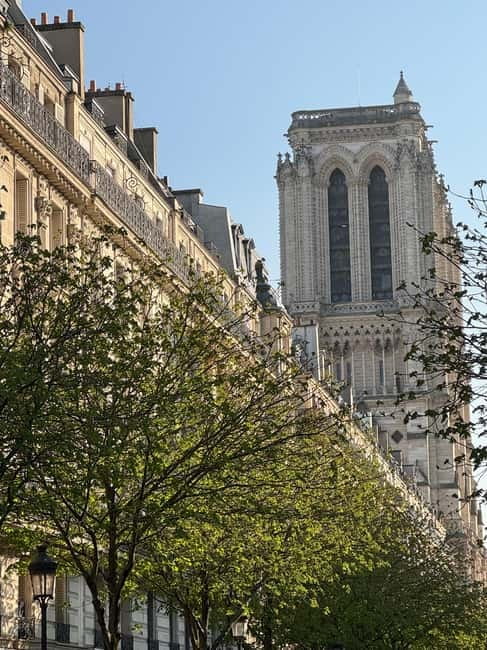 Paris: Notre-Dame Cathedral Exterior Guided Tour - The one-hour outside loop: spires, gargoyles, and rosettes at street level
