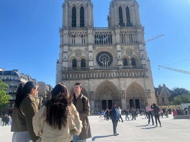 Paris: Notre-Dame Cathedral Exterior Tour & Free Entrance - The 2019 fire and the restoration progress to December 2024