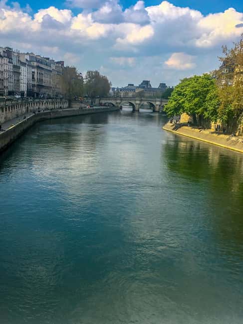 Paris: Notre Dame Exteriors and Ile de la Cité Walking Tour - Conciergerie and Palais de Justice: Where Royal Power Meets Revolution