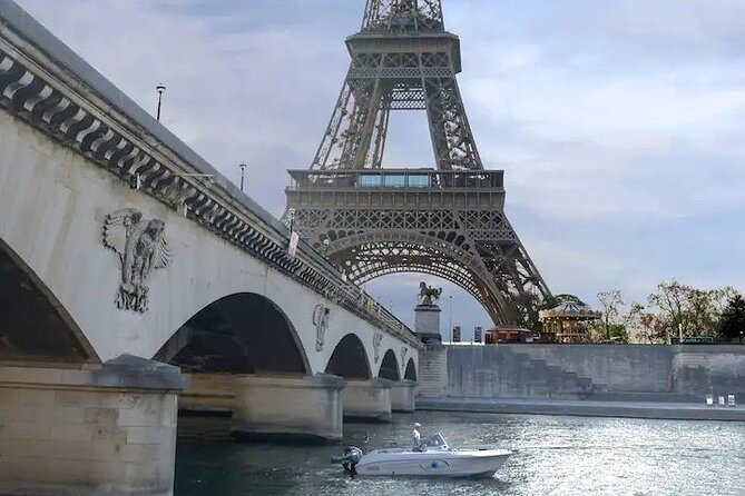 Paris Private Boat Tour with your own Captain Guide - Eiffel Tower and the Bras de Grenelle photo stop
