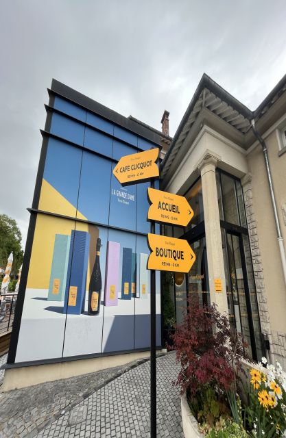 Paris: Private Epernay Trip with Champagne Vineyard Tastings - The big producer visit: museum tools, film, and cave chill