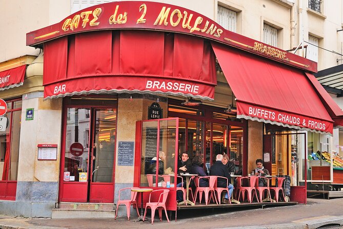 Paris Private Full Day Tour: Montmartre, Sights & Eiffel Tower - Montmartre Cemetery, a quieter side with protected tombs