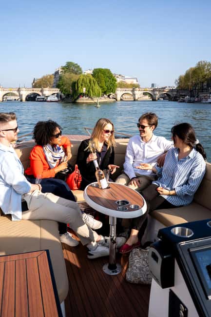 Paris: Private Small Boat Cruise with Rosé and Macarons - A private Seine cruise that focuses on the views, not the lineups