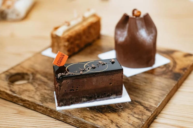 Paris: Saint Germain des Prés Guided Foodie Walking Tour - Landmark passes that do not slow the food pace