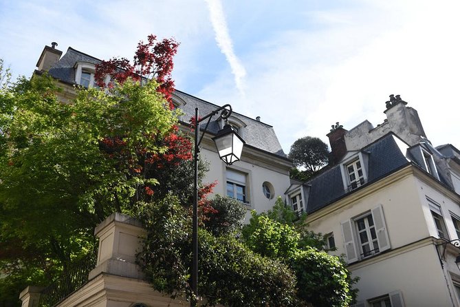 Paris Saint-Germain French Gastronomy Tasting Food Tour - Church squares, quick views, then right into café history