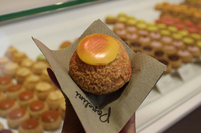 Paris Sweet & Chocolate Family Treasure Hunt - Stop 1 inside Paris oldest chocolate store: the tour gets fun fast