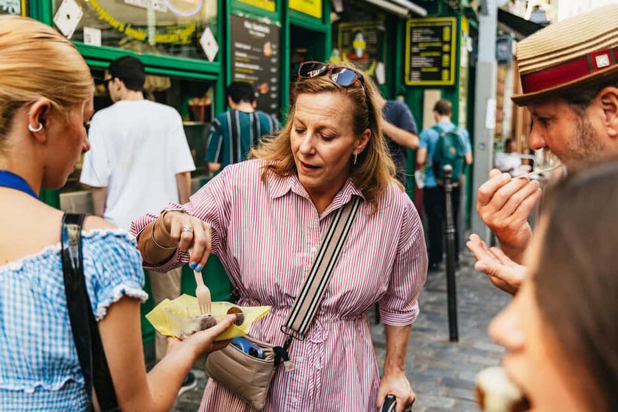 Paris: Walking Food Tour with Cheese, Wine and Delicacies - Charcuterie, cured ham, and pastry breaks that reset your walk