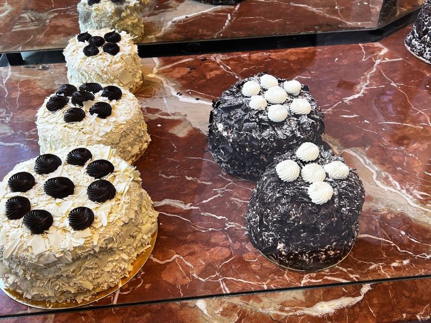 Paris: Walking Food Tour with Cheese, Wine and Delicacies - Chocolates and seasonal French specialties, not just desserts