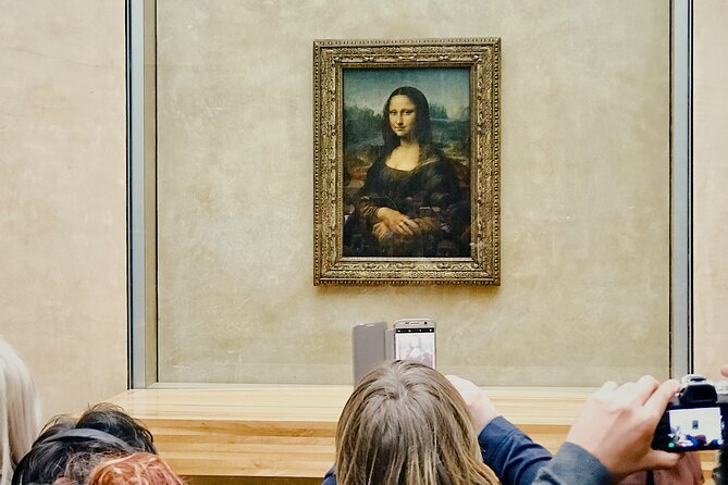 Private Louvre Museum Guided Tour - Timed entry included - Entering the Louvre Pyramid, starting from a real landmark