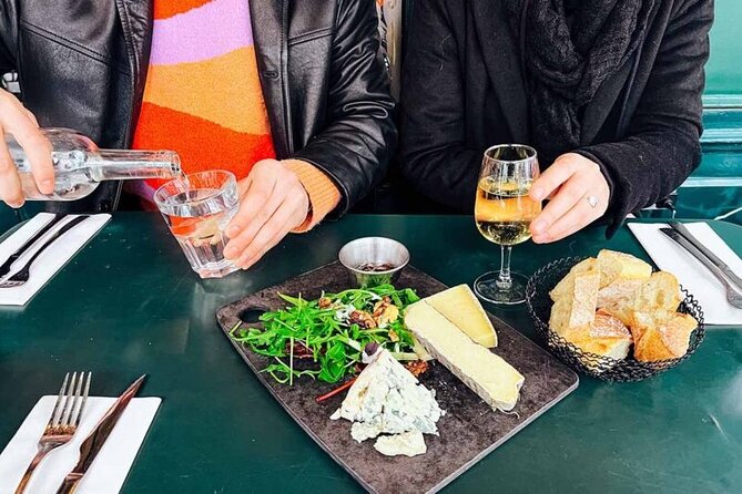 Private Parisian Food Tour in Charming Neighborhood Le Marais - Entering Le Marais with food as your map