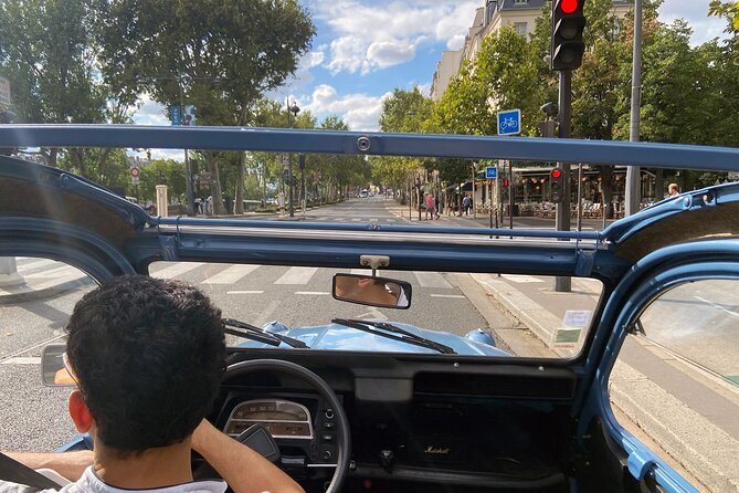 Private Tour of Paris in a convertible citroën 2CV - Starting at Hôtel de Crillon and the Louxor obelisk: Paris power in one look