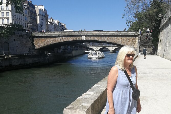 Private Tour with Tickets to the Louvre Museum & Crepes - Notre-Dame area sights, markets, and a tower for big views