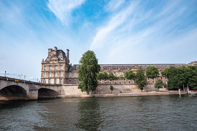 River Seine Sightseeing Boat Tour with Audio Guide - The Louvre, Place de la Concorde, and the Big-Sky Photo Stretch