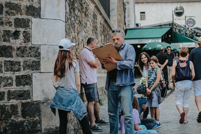 Sacred Heart and Montmartre with private guide - Au Lapin Agile and the Montmartre vineyard moment