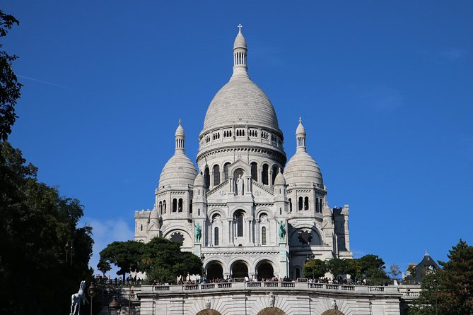 See 10+ Top Paris Sights, Fun Guide - Dalida, Place du Tertre, and the streets behind the postcards