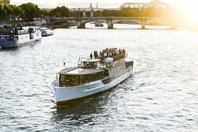 Seine River Direct Access Guided Cruise - Onboard experience: electric boat, panoramic windows, and live narration