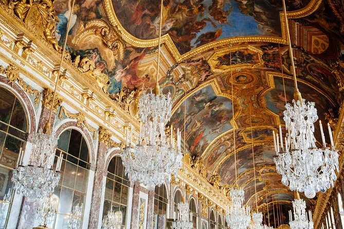 Small Group VIP Versailles Bike Tour from Paris with King's Apartments Access - Place du Marché Notre Dame: building a picnic and keeping the day flexible