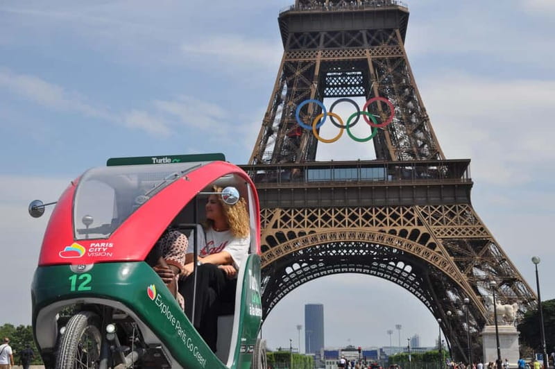 The Tout Paris Private Rickshaw bike Tour with Audio Guide - Getting started near the Louvre, then back to 99 Rue de Rivoli