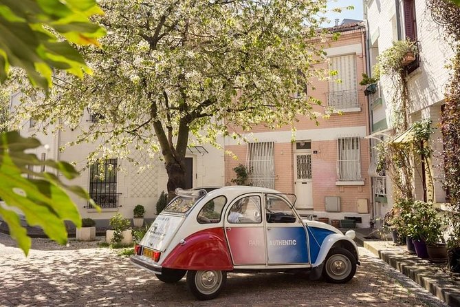 Tour in a vintage car with a Parisian - Place des Vosges: A Classic Square You Can Actually Enjoy
