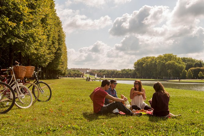 Versailles Bike Tour with Market, Gardens & Guided Palace Tour - The town market at Place du Marché Notre Dame, where lunch becomes a mini-adventure