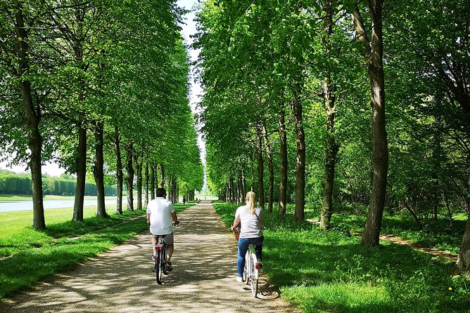 Versailles Bike Tour with Market, Gardens & Guided Palace Tour - Royal Gardens by bike: faster viewing, less fatigue