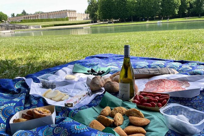 Versailles Full-Day Electric Bike Tour : Market, Picnic & Palace - Notre Dame market lunch: cheese, bread, and a plan that actually works