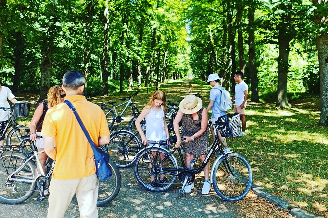 Versailles Golfcart & Bike Guided Tour: Gardens Hamlet Fountains - Stop 2: Grand Canal cycling inside the Royal Domain (and avoiding traffic stress)