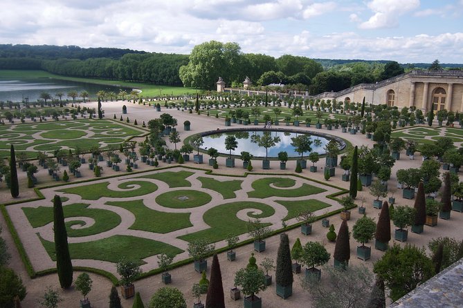 Versailles Palace and Gardens Tour by Train from Paris - Gardens of Versailles: Fountains, Musical Days, and Best Expectations