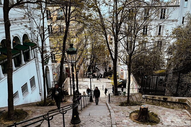 Walking Tour in Montmartre with a guide - Stop 4: Chateau dEau de Montmartre and the view of the neighborhood’s plumbing