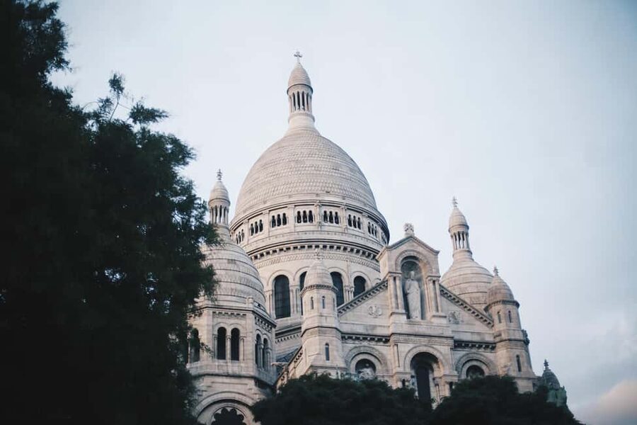 Walking Tour in Paris Montmartre with Tastings and Stories - The sweet lineup: macaron, Proust biscuits, and crêpe